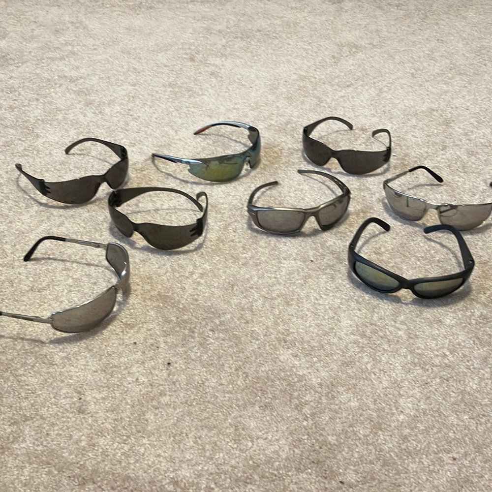 8 pair of men’s sunglasses